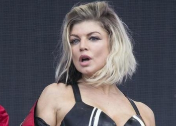 FILE - In this July 10, 2016, file photo, U.S. singer Fergie performs at the Wireless Festival in north London. Black Eyed Peas leader will.i.am said in a recent interview that Fergie is no longer in the group, but later said the songstress will always be a Pea. In the interview, will.i.am says that nobody is replacing Fergie and that the Black Eyed Peas are working on a new project.  (Photo by Joel Ryan/Invision/AP, File) ORG XMIT: NYET521