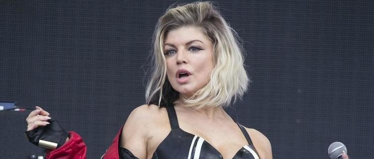FILE - In this July 10, 2016, file photo, U.S. singer Fergie performs at the Wireless Festival in north London. Black Eyed Peas leader will.i.am said in a recent interview that Fergie is no longer in the group, but later said the songstress will always be a Pea. In the interview, will.i.am says that nobody is replacing Fergie and that the Black Eyed Peas are working on a new project. (Photo by Joel Ryan/Invision/AP, File) ORG XMIT: NYET521